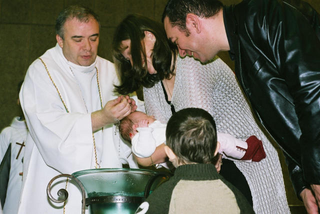 Act of christening - water