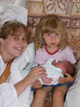V porodnici, 3.8.2004 ( mummy, Lucy and a little sister Tereza)